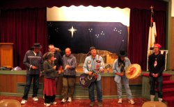 Sacred Circle Singers, Kid Valance on guitar, Tuffie Isham on drum, Larry Bringing Good on harp